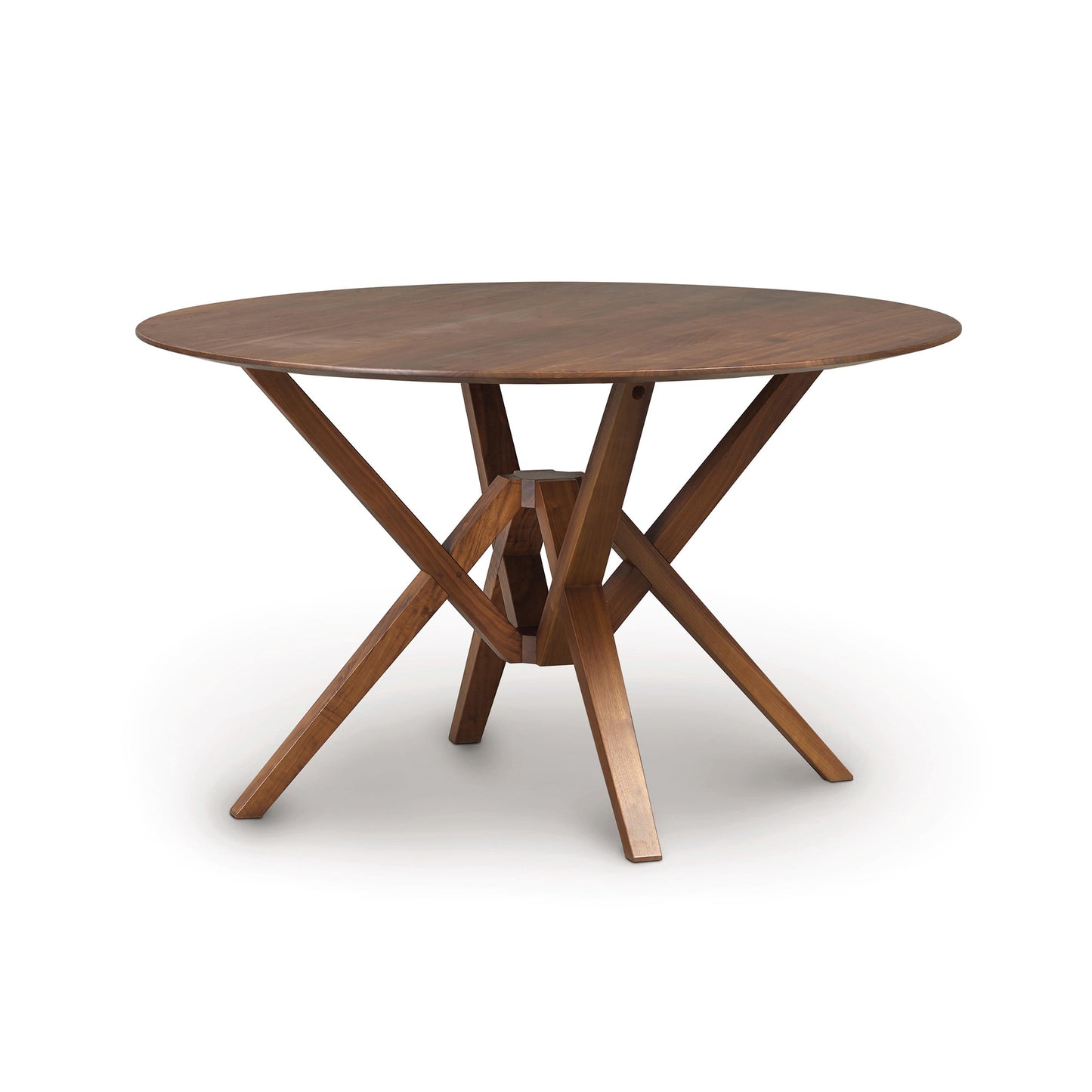 Exeter Round Solid Top Dining Table by Copeland Furniture, showcasing a natural hardwood top and unique geometric legs, handcrafted in Vermont.