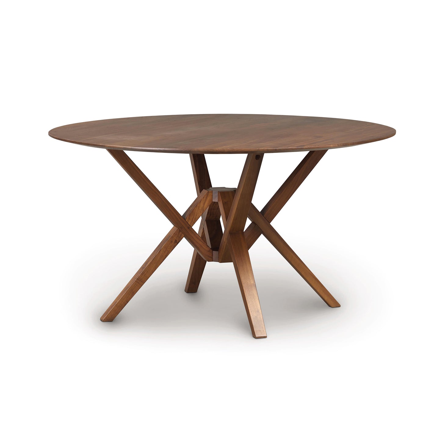 Exeter Round Solid Top Dining Table by Copeland Furniture, showcasing a smooth hardwood surface and distinctive geometric legs, expertly crafted from sustainable wood.