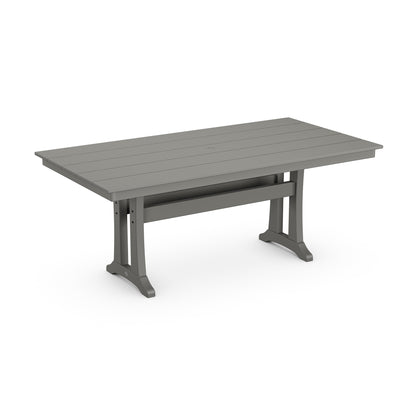 A modern, gray rectangular POLYWOOD Farmhouse Trestle 37" x 72" Dining Table set against a white background, featuring a textured POLYWOOD® top and sturdy metallic legs with an industrial design.