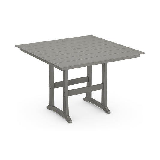 Gray POLYWOOD Farmhouse Trestle 59" Bar Table featuring a slatted top and sturdy legs.