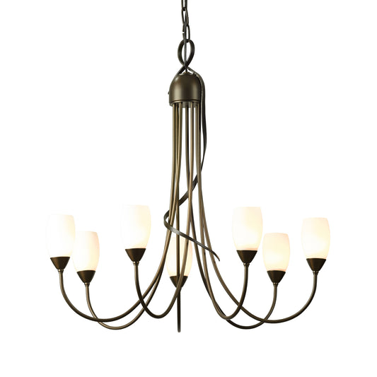 A Flora 7-Arm Chandelier with frosted glass shades from Hubbardton Forge.