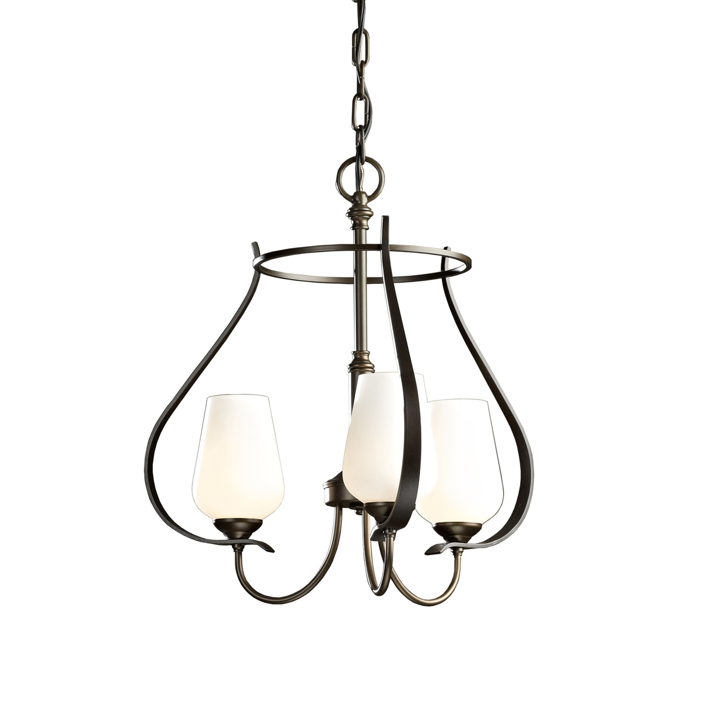 The Flora Chandelier by Hubbardton Forge features a white glass shade and is crafted using environmentally safe metal forging techniques.