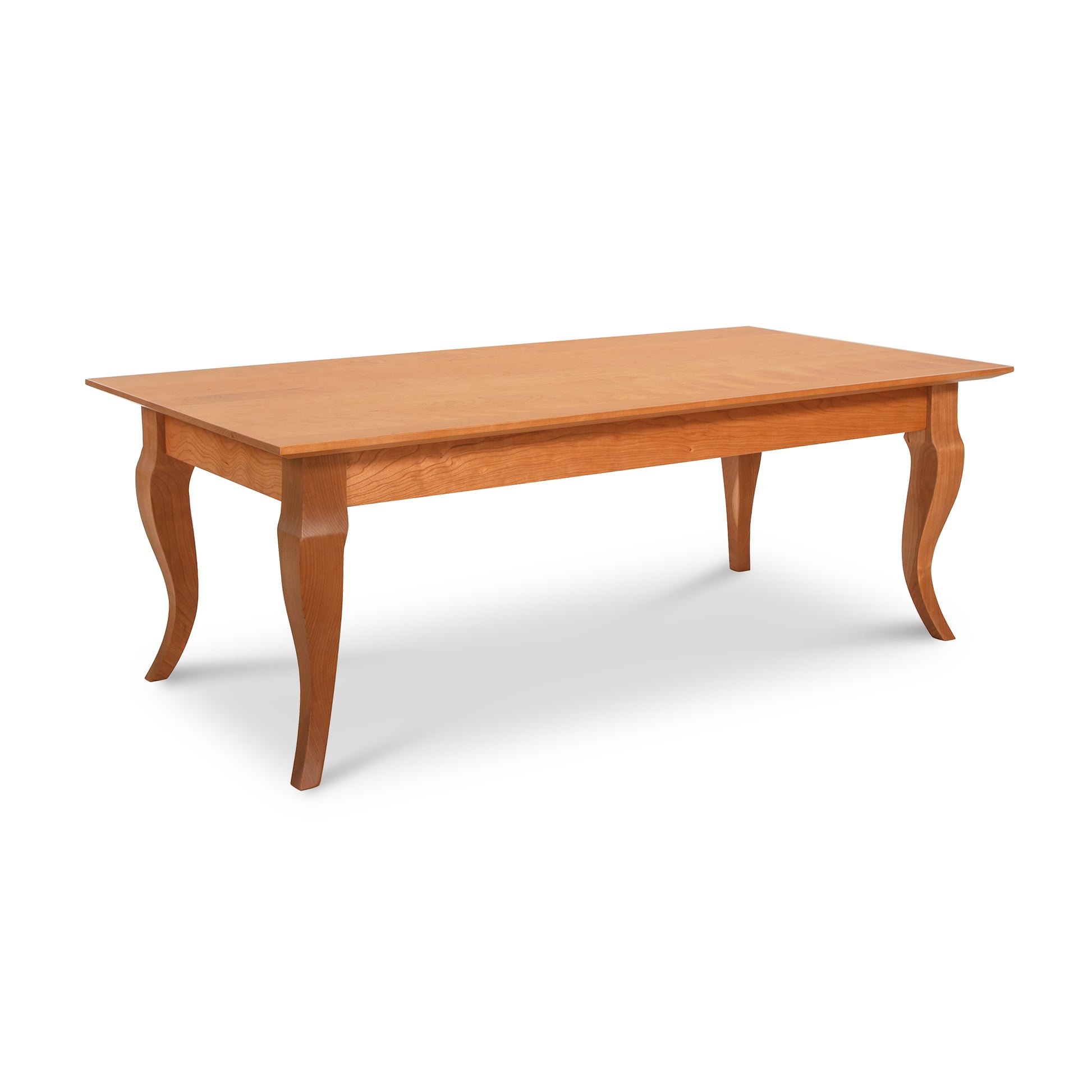 A Lyndon Furniture French Country Coffee Table with a solid wood top and legs.