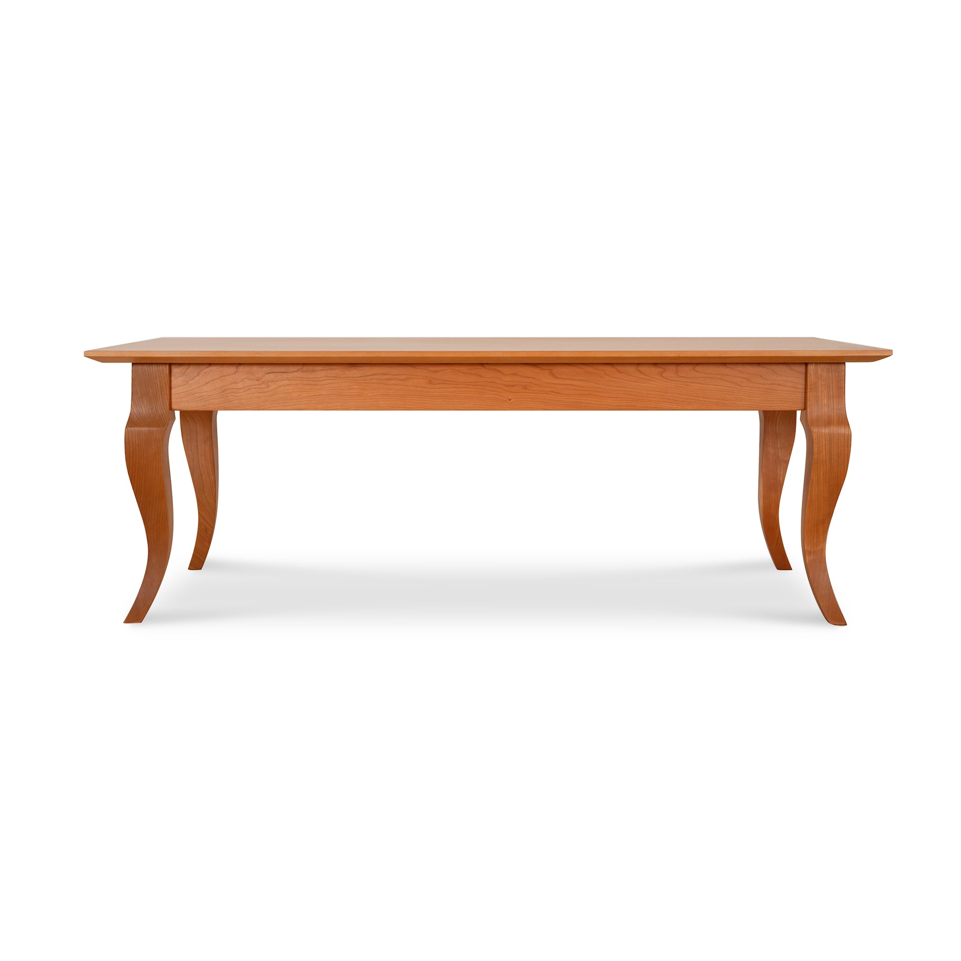 French Country Coffee Table by Lyndon Furniture featuring curved legs and solid hardwood construction.