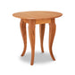 A French Country Round End Table with a wooden top and legs, part of the Lyndon Furniture Collection.