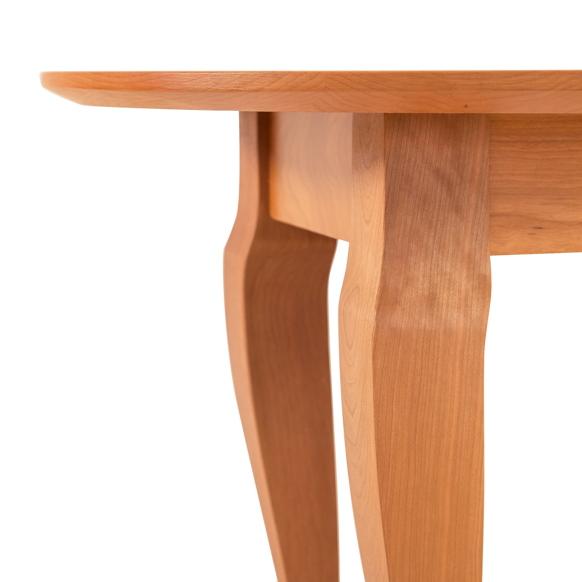 Lyndon Furniture French Country Round End Table, handcrafted from solid wood with elegant curved legs and a smooth edge.