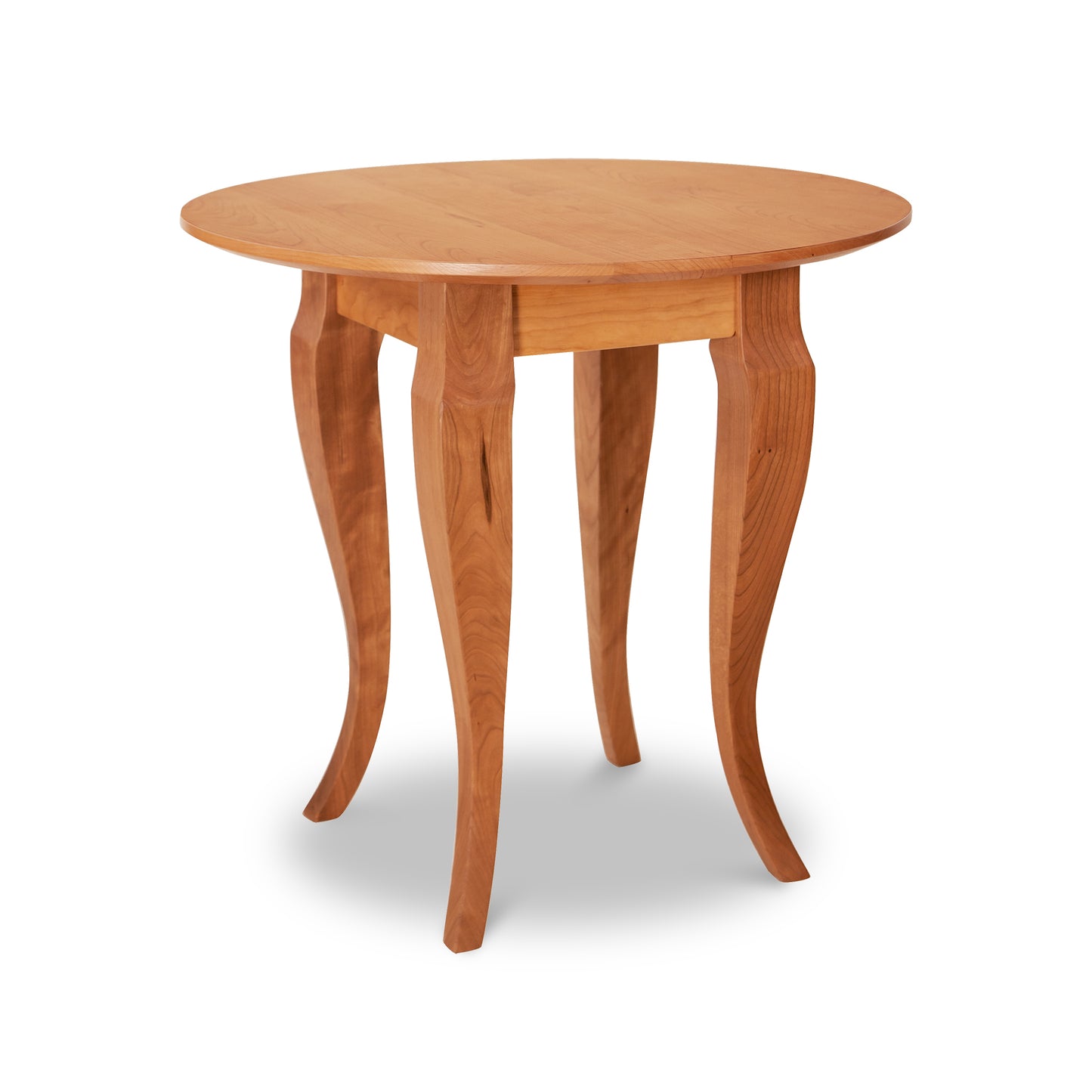 French Country Round End Table by Lyndon Furniture, handcrafted from solid wood with four elegant curved legs and a smooth round top.