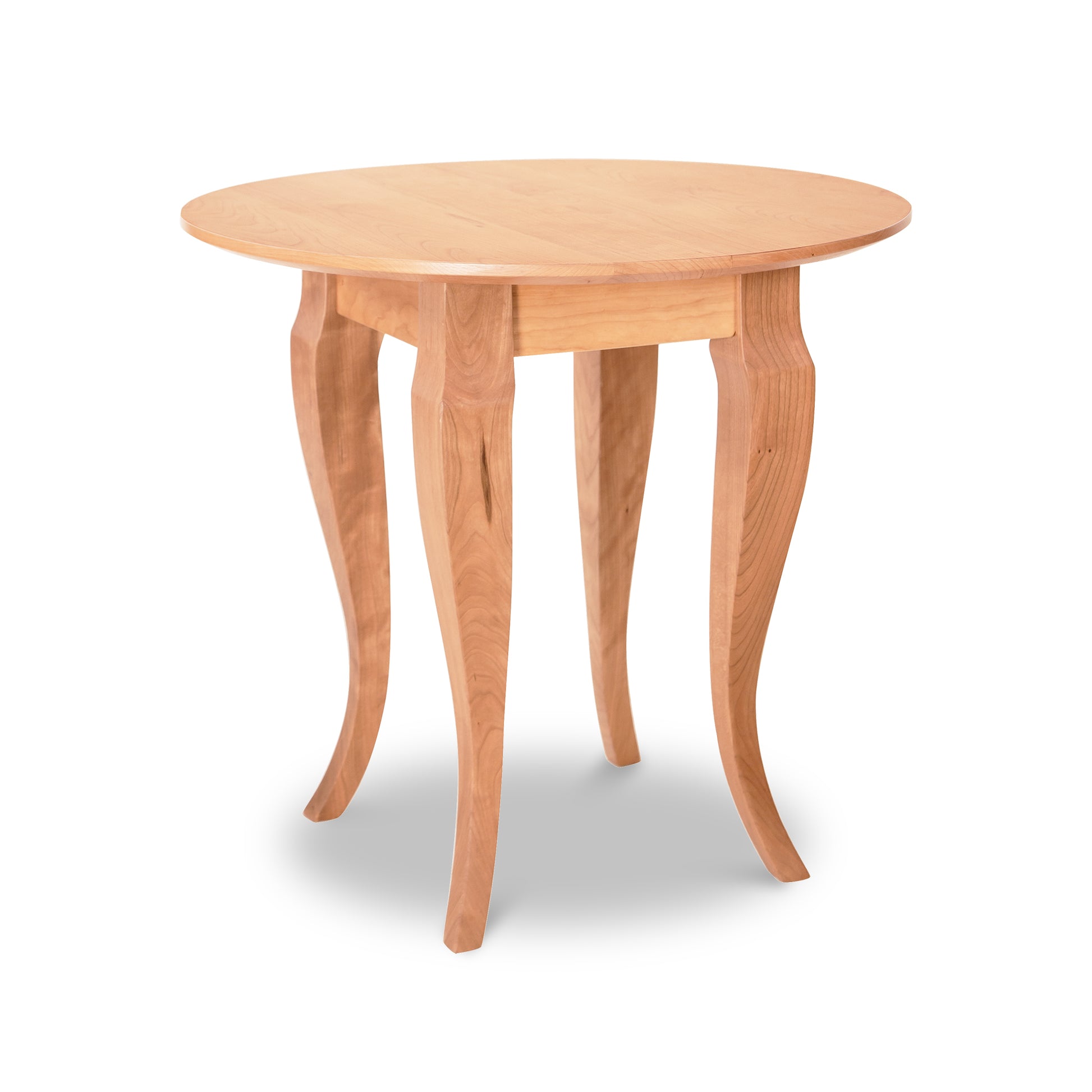 Lyndon Furniture French Country Round End Table with four curved legs and solid wood construction.