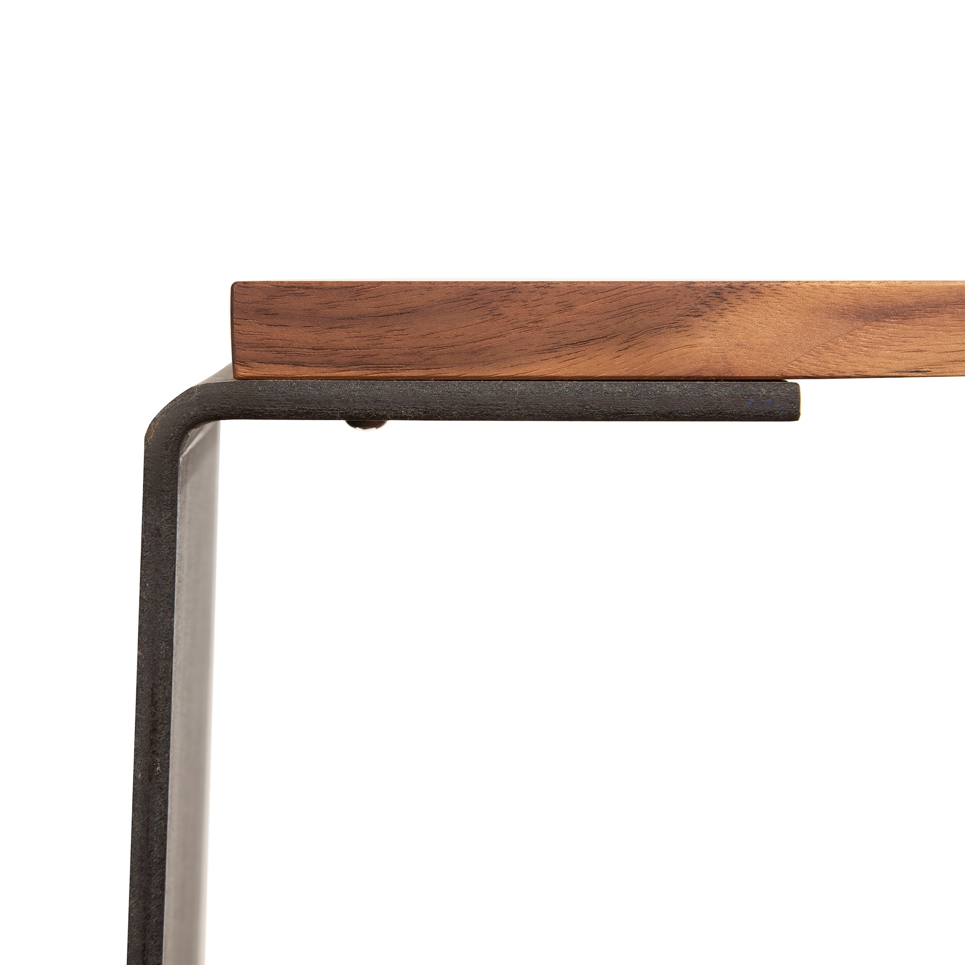 Corner detail of G Table by Vermont Woods Studios, featuring a solid natural hardwood top and sleek black metal frame.