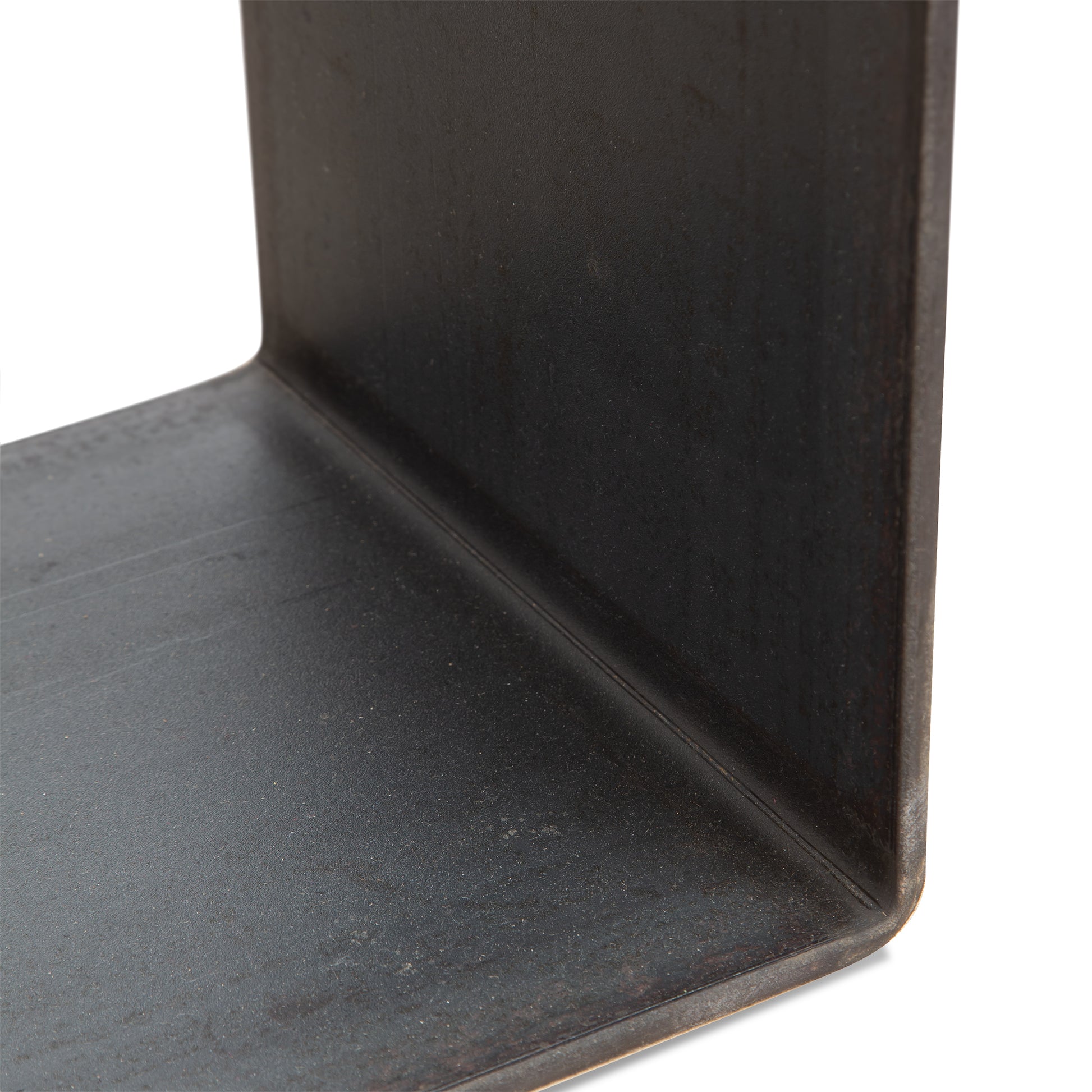 Close-up of the G Table by Vermont Woods Studios, highlighting its unique L-shaped metal bracket with a textured dark finish.