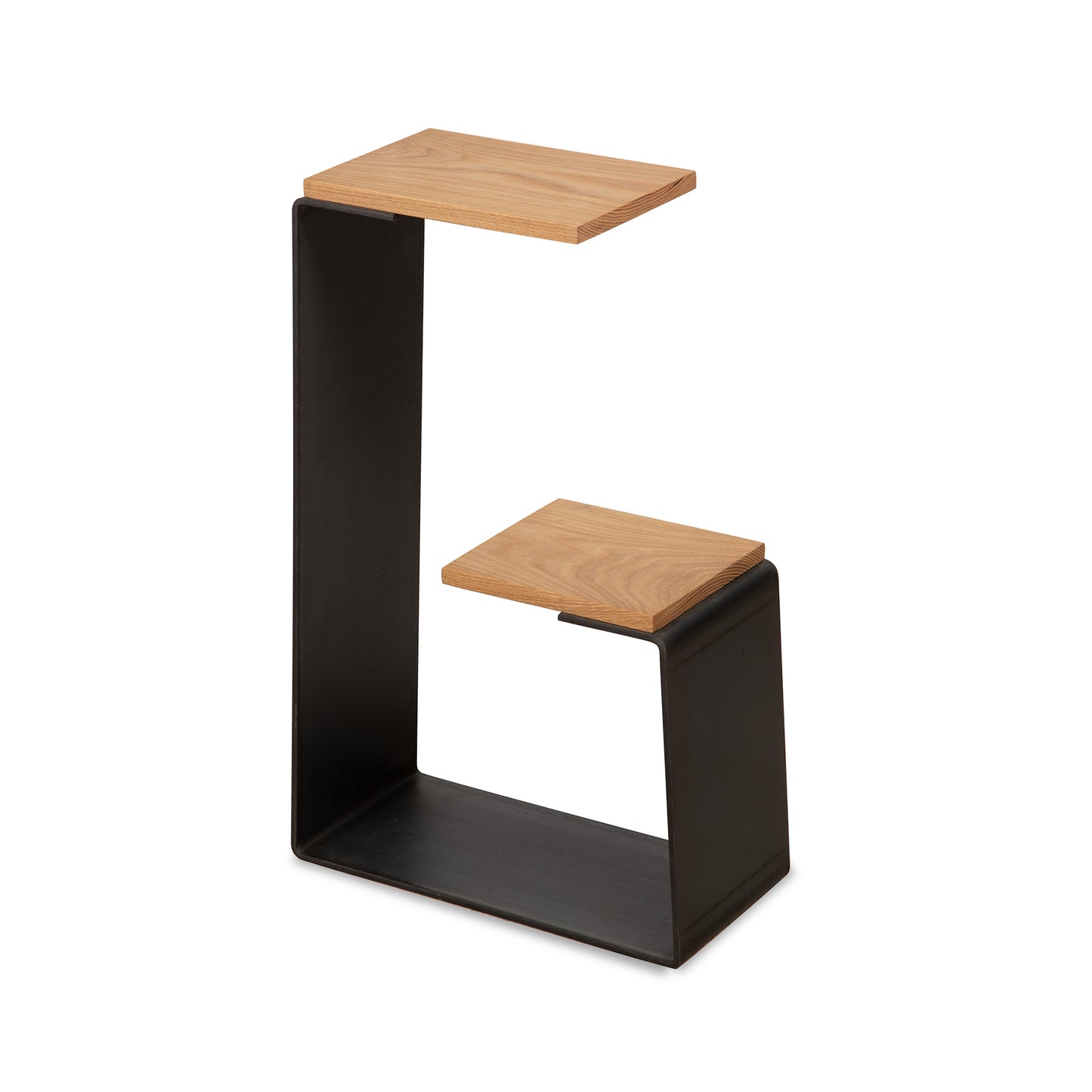 G Table featuring a black metal frame with two light wood surfaces in a striking geometric design, crafted by Vermont Woods Studios.