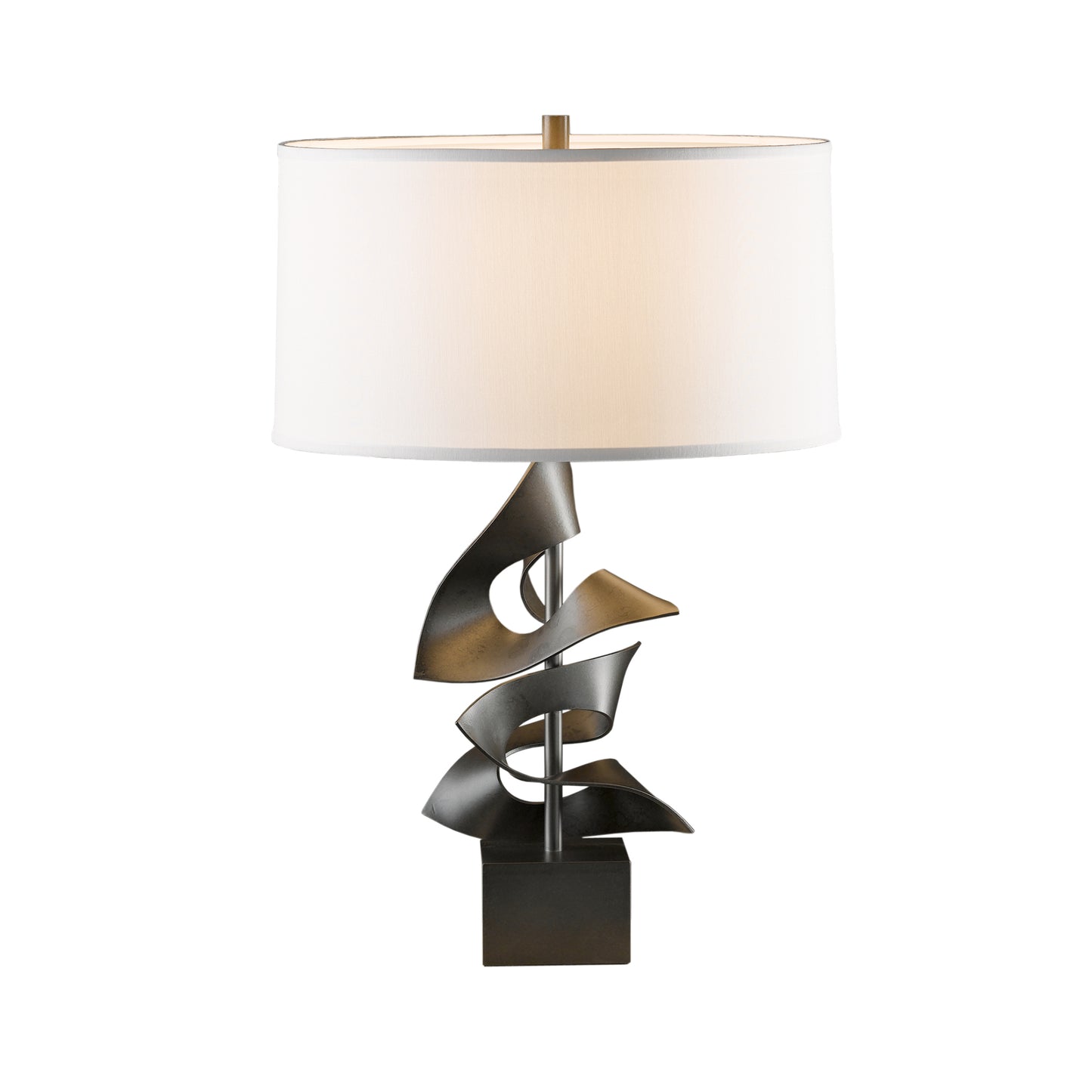 Two Fold Table Lamp by Hubbardton Forge with a sculptural twisted metal base and white drum shade, showcasing elegant American made craftsmanship.