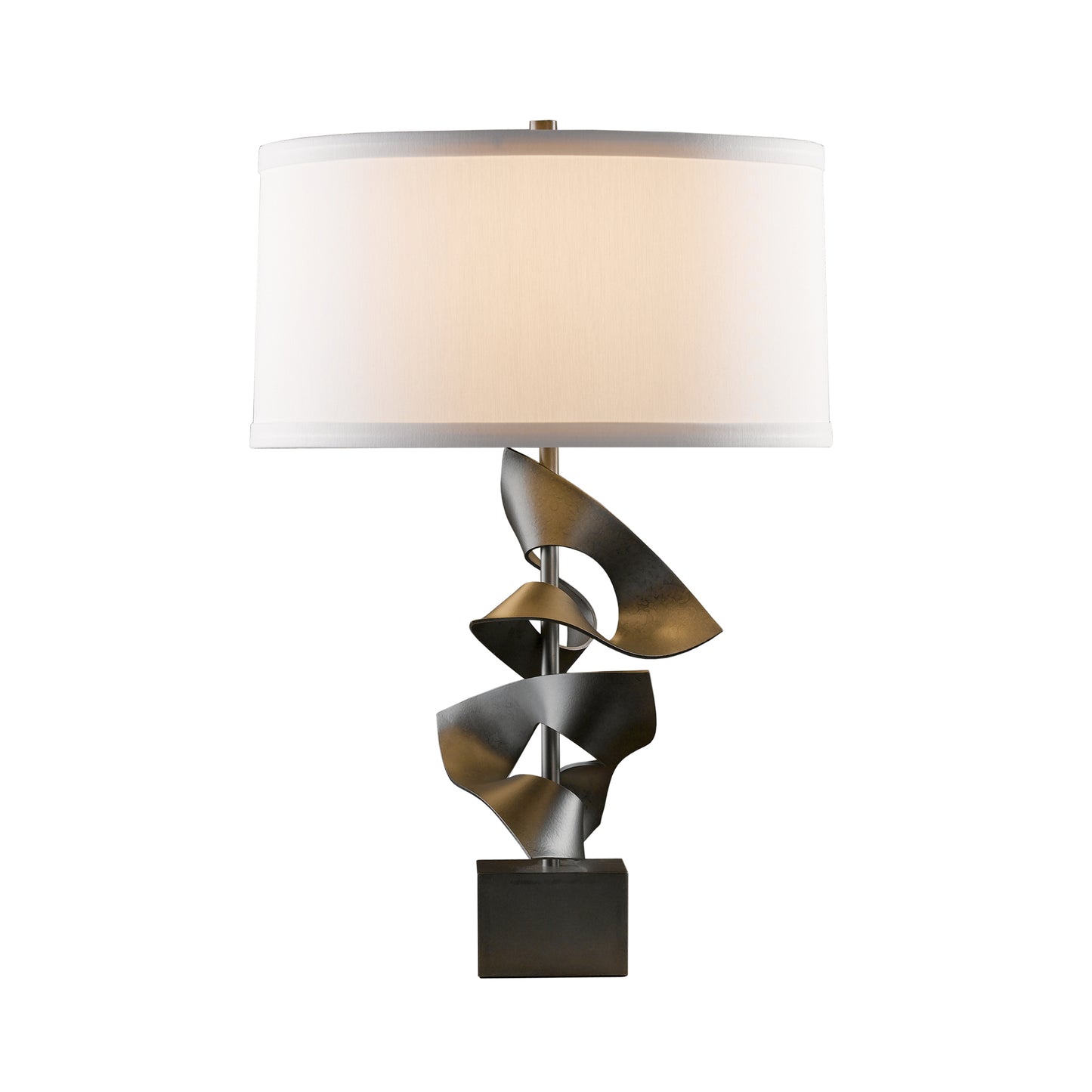Gallery Two Fold Table Lamp by Hubbardton Forge with a sculptural metallic base and large white drum shade, showcasing artisan American craftsmanship.