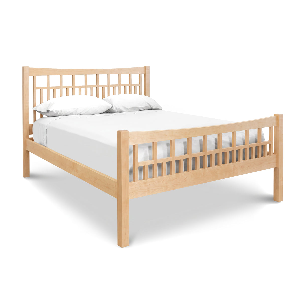 Glastenbury Platform Bed by Vermont Furniture Designs with slatted headboard and white sheets, showcasing an Arts and Crafts aesthetic.