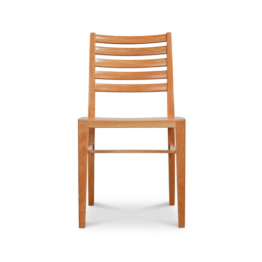 The Grafton Chair floor model by Vermont Woods Studios, crafted in natural cherry with a slatted backrest, showcasing fine American woodworking.