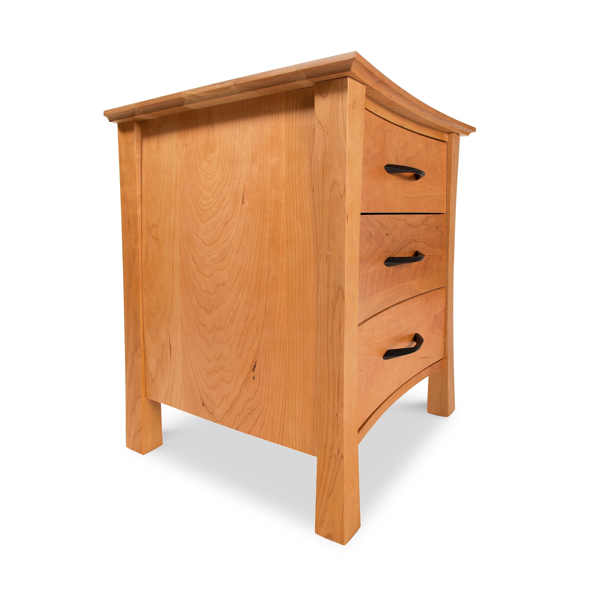 Green Mountain 3-Drawer Nightstand by Lyndon Furniture, light wood with black curved handles, angled view.