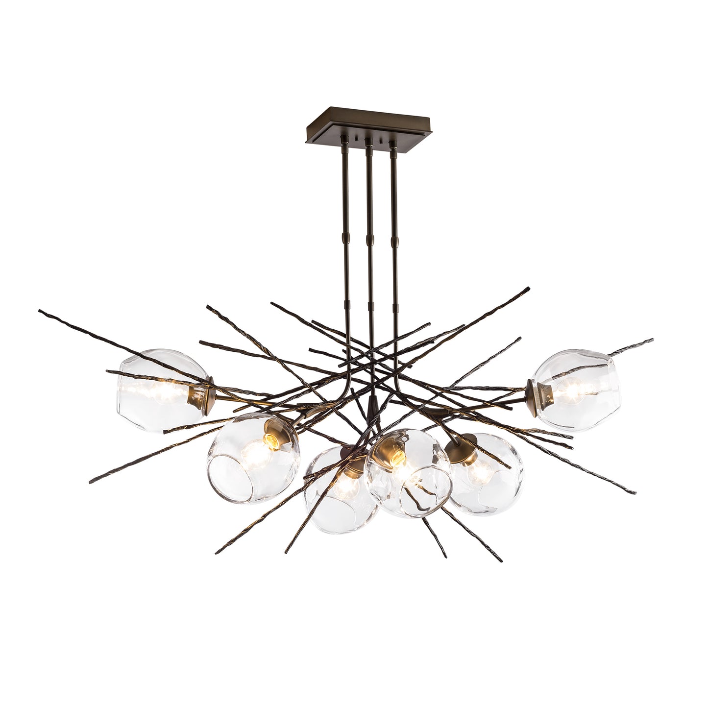 A modern chandelier with Hubbardton Forge's Griffin Pendant and glass balls hanging from it.