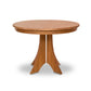A sturdy Hampton Split Pedestal Round Table with a solid wood base by Lyndon Furniture.