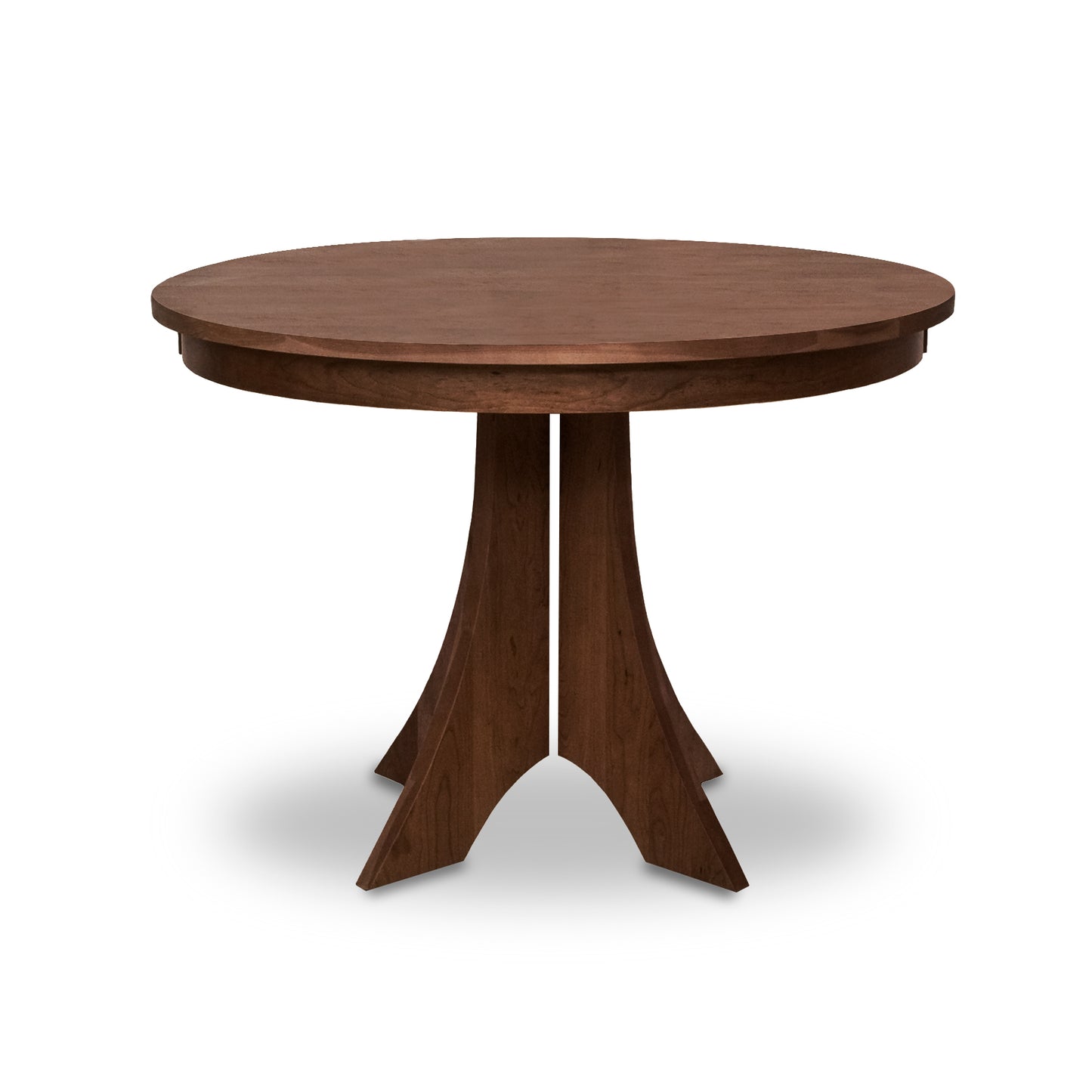 Lyndon Furniture Hampton Split Pedestal Round Table with a smooth round top and curved pedestal legs, showcasing handcrafted American wood design.