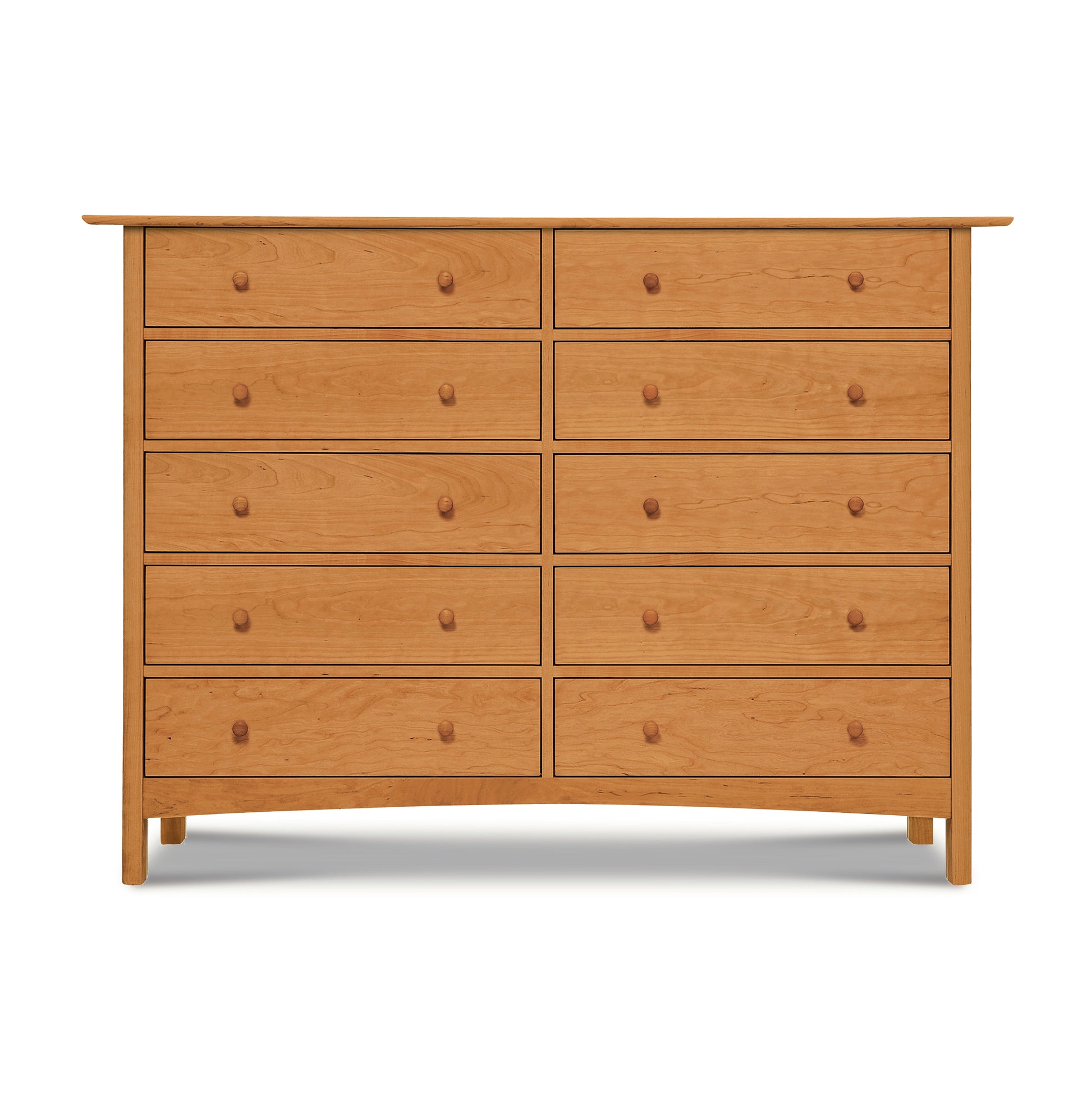 A Heartwood Shaker 10-Drawer Dresser from the Vermont Furniture Designs Modern Shaker Furniture Collection, featuring a simple design and round knobs, isolated on a white background.