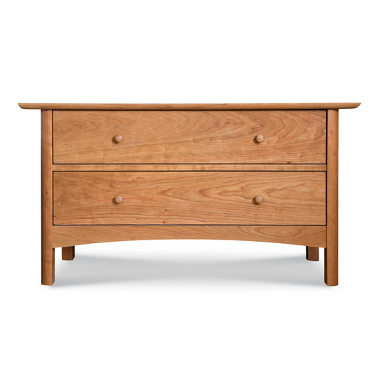 Heartwood Shaker 2-Drawer Blanket Chest by Vermont Furniture Designs with round knobs, natural wood finish, and signature flared legs.