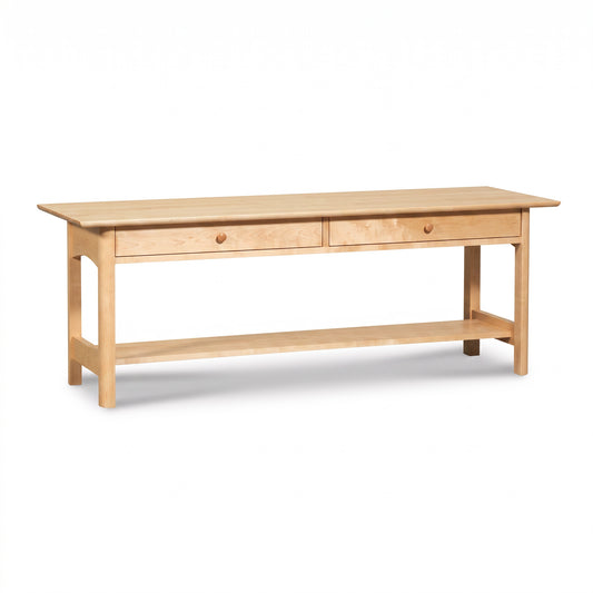 Heartwood Shaker 2-Drawer Coffee Table in light wood by Vermont Furniture Designs, showcasing two drawers and a lower shelf.