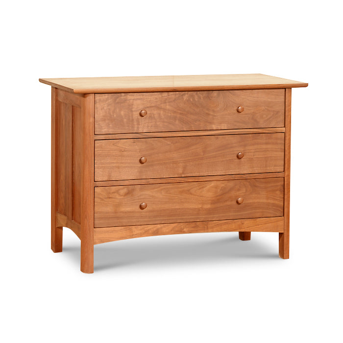 Heartwood Shaker 3-Drawer Chest by Vermont Furniture Designs with a natural wood finish, round knobs, and four short legs.