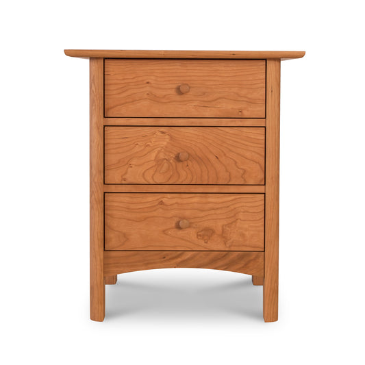 Heartwood Shaker 3-Drawer Nightstand with solid wood construction, elegant curved legs, and minimalist design by Vermont Furniture Designs.