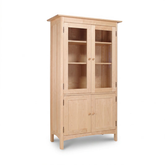 Heartwood Shaker 4-Door Bookcase in handcrafted light wood, featuring glass doors and adjustable interior shelves by Vermont Furniture Designs.