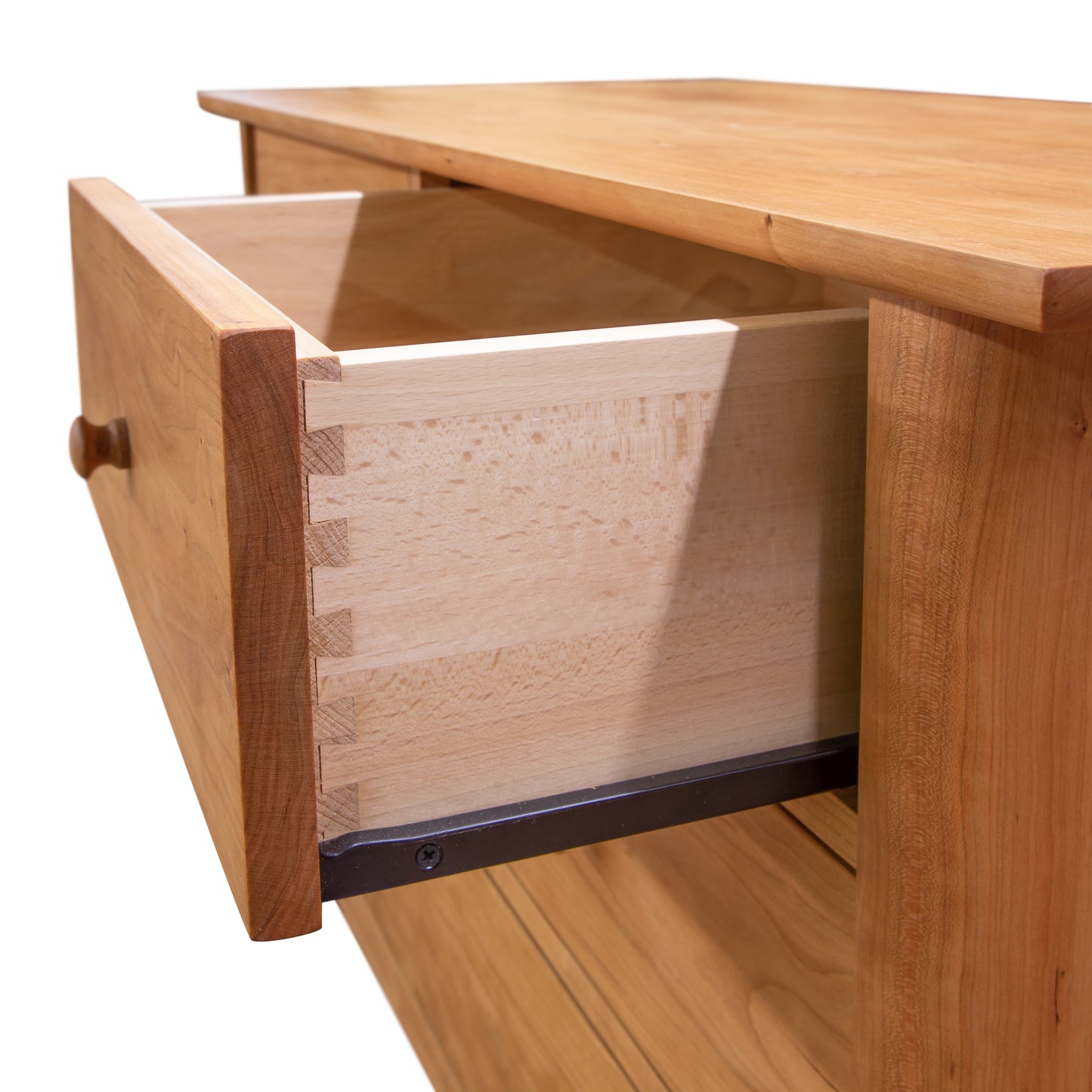 Heartwood Shaker 4-Drawer Dresser by Vermont Furniture Designs featuring visible dovetail joints and smooth metal slides on an open drawer.