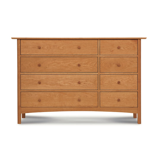 Heartwood Shaker 8-Drawer Dresser by Vermont Furniture Designs with round knobs and oil finish, showcasing classic American craftsmanship.