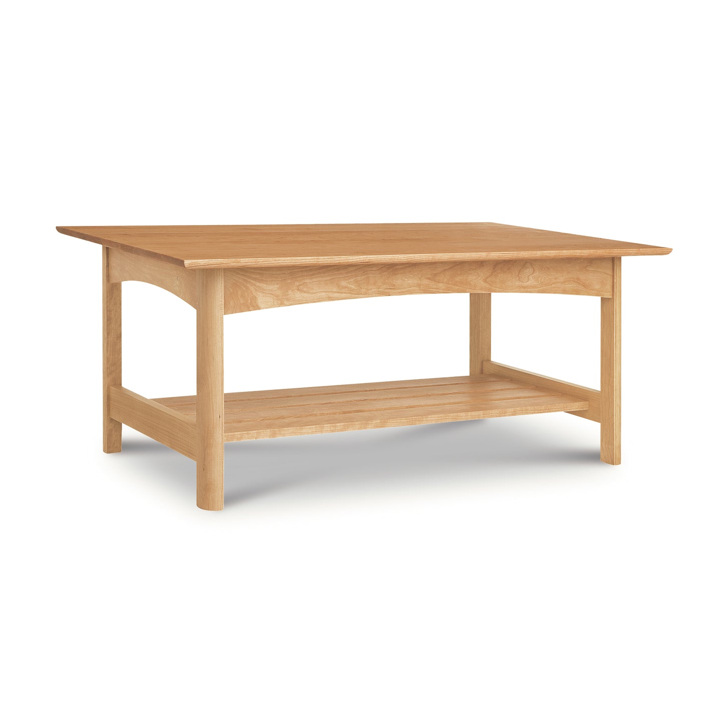 A handmade Vermont Furniture Designs Heartwood Shaker Coffee Table with a lower shelf, isolated on a white background.