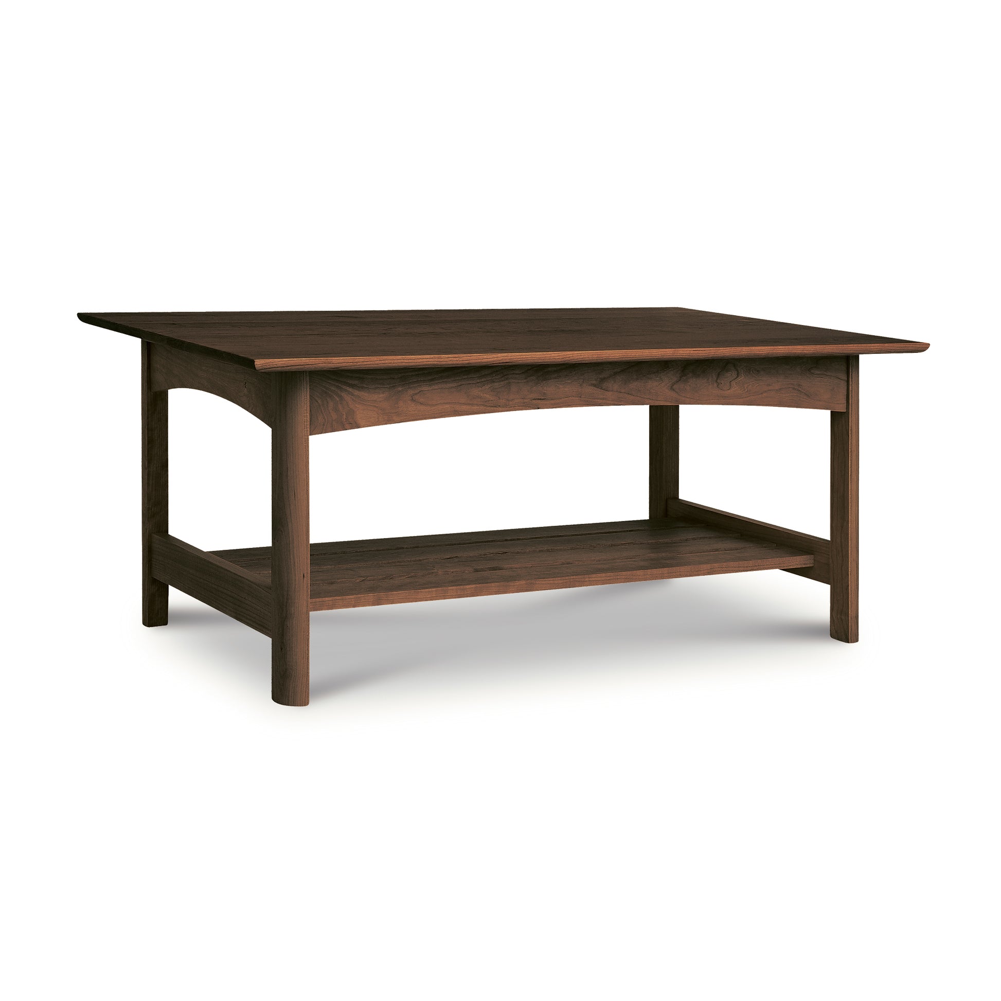 A handmade Vermont Furniture Designs Heartwood Shaker Coffee Table made of solid wood with a lower shelf, isolated on a white background.