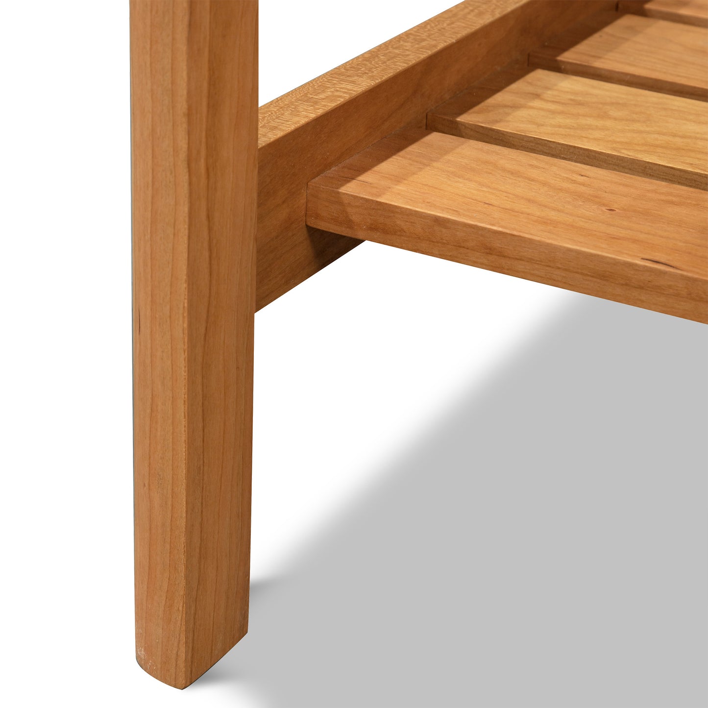 Heartwood Shaker Lamp Table by Vermont Furniture Designs, featuring solid wood craftsmanship and eco-friendly oil finish, highlighting the leg and lower shelf details.