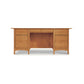 Heartwood Shaker Executive Desk, handmade luxury furniture with multiple drawers and a recessed center panel, isolated on a white background. Created by Vermont Furniture Designs.