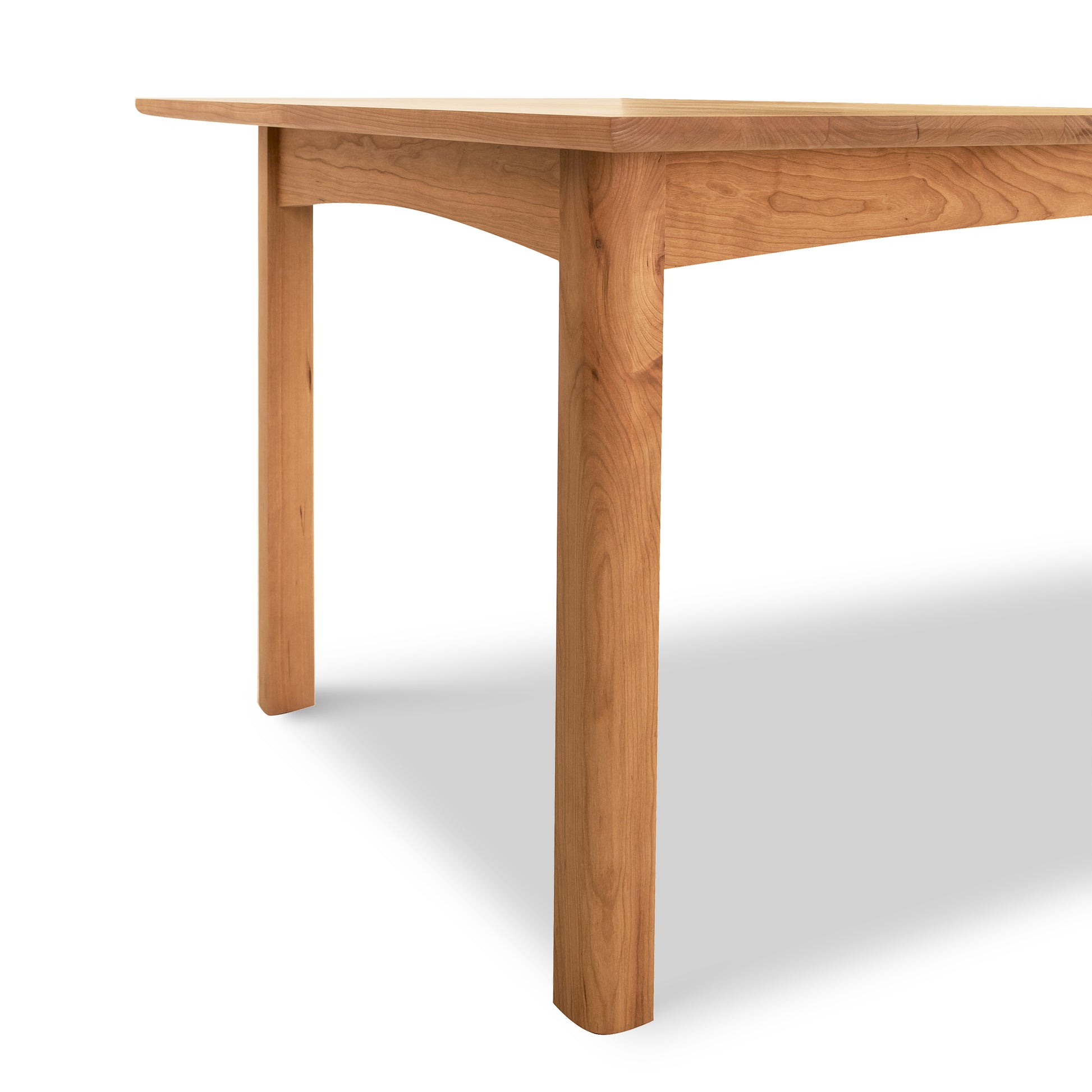 Heartwood Shaker Extension Dining Table with eco-friendly oil finish, expertly crafted from solid wood by Vermont Furniture Designs.