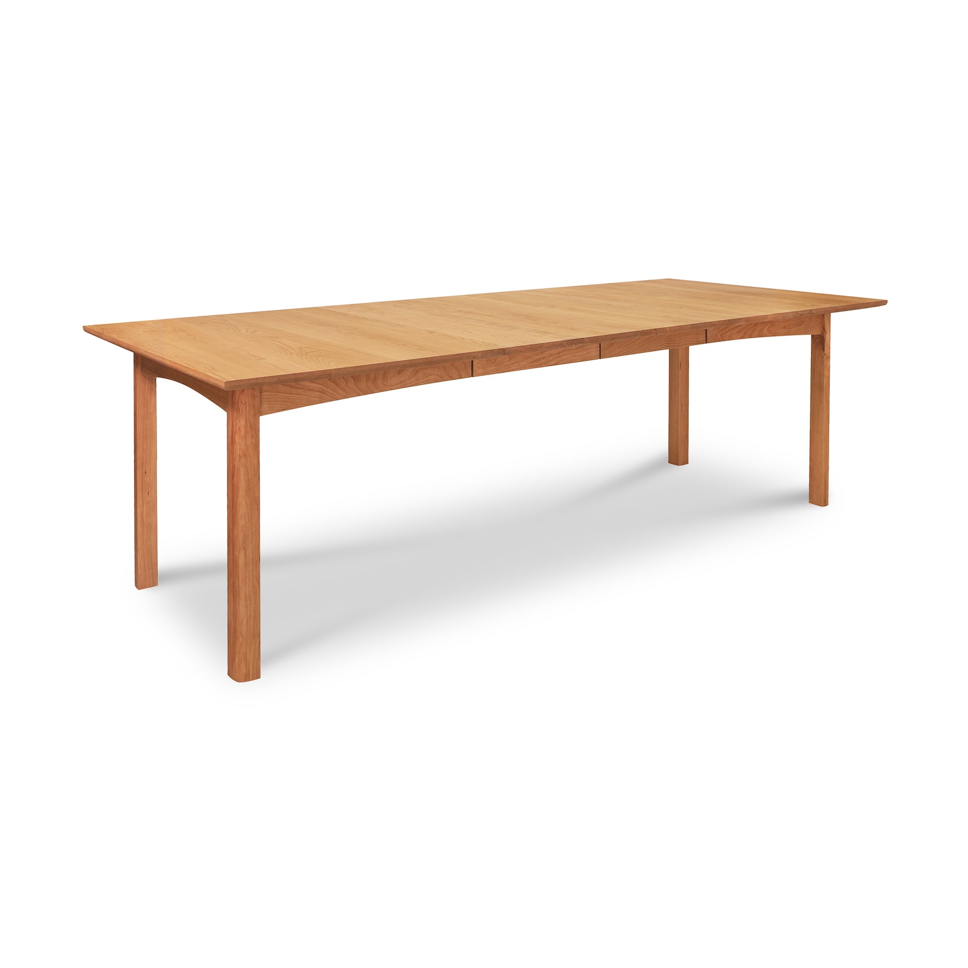 Heartwood Shaker Extension Dining Table by Vermont Furniture Designs, crafted in solid wood with eco-friendly oil finish, displayed against a plain background.
