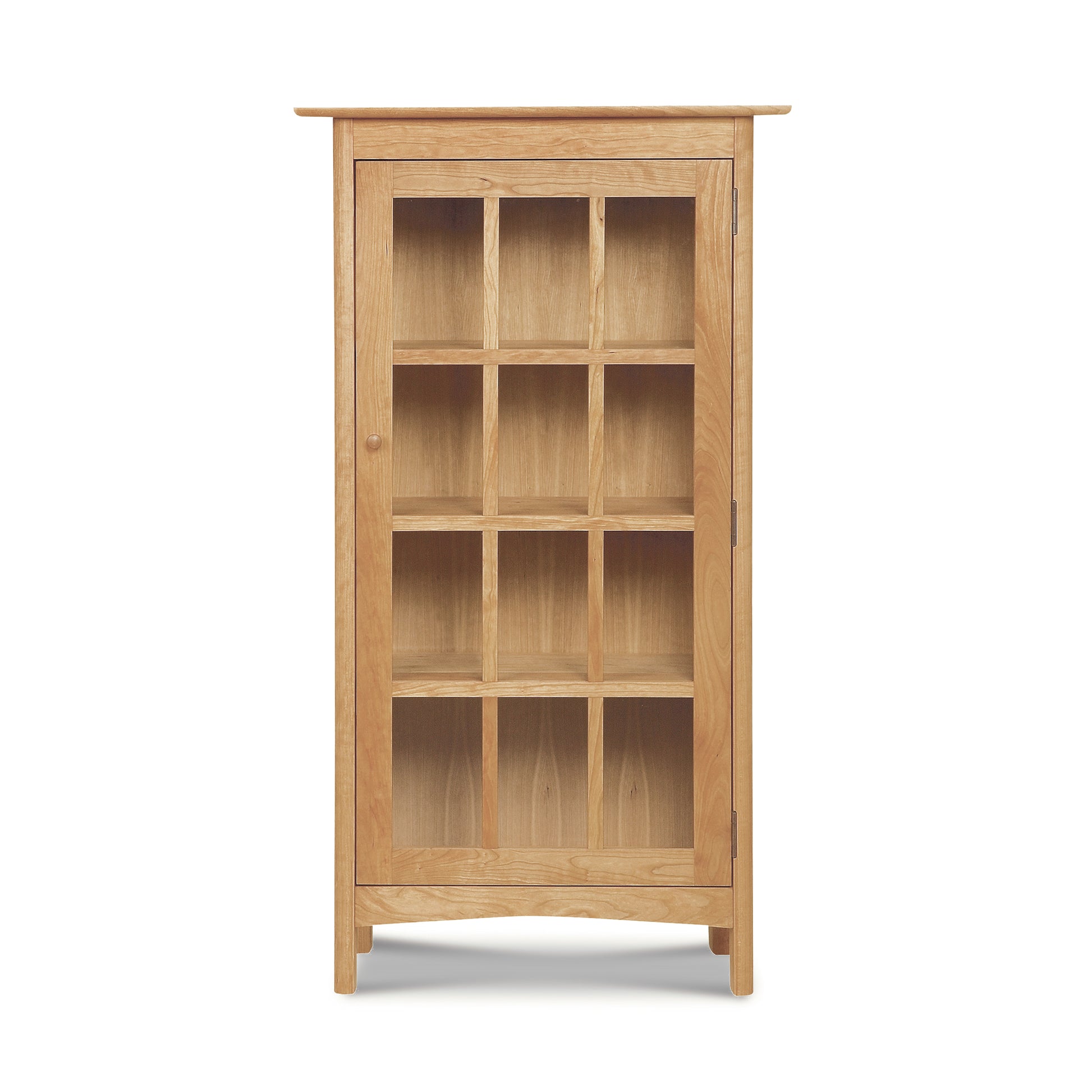 Empty Vermont Furniture Designs Heartwood Shaker Glass Door Bookcase with multiple compartments, isolated on a white background.