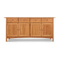 A solid wood Vermont Furniture Designs Heartwood Shaker Long Sideboard with six drawers and three cabinets, isolated on a white background.