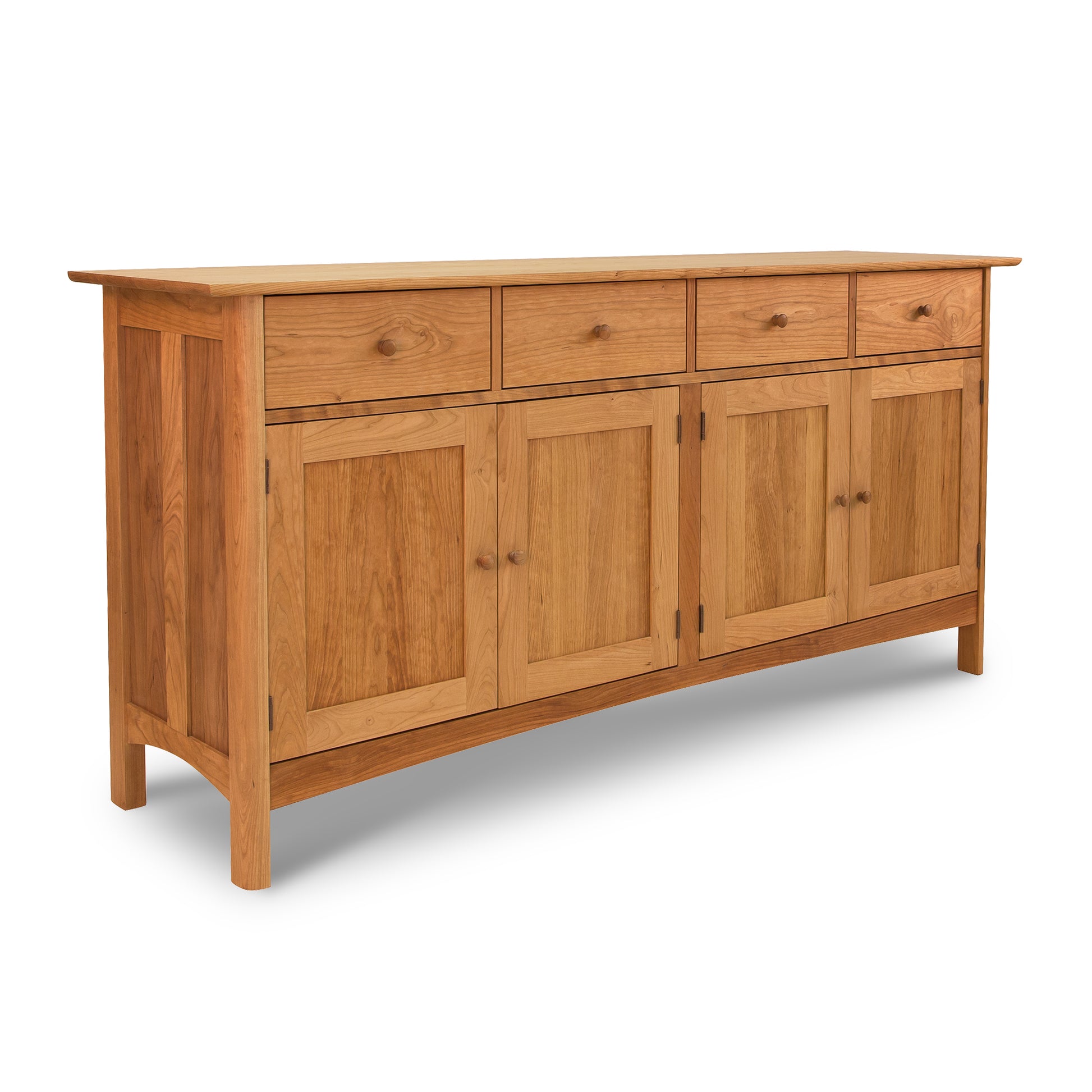 Heartwood Shaker Long Sideboard with three drawers and four doors on a white background, perfect for contemporary kitchen storage by Vermont Furniture Designs.