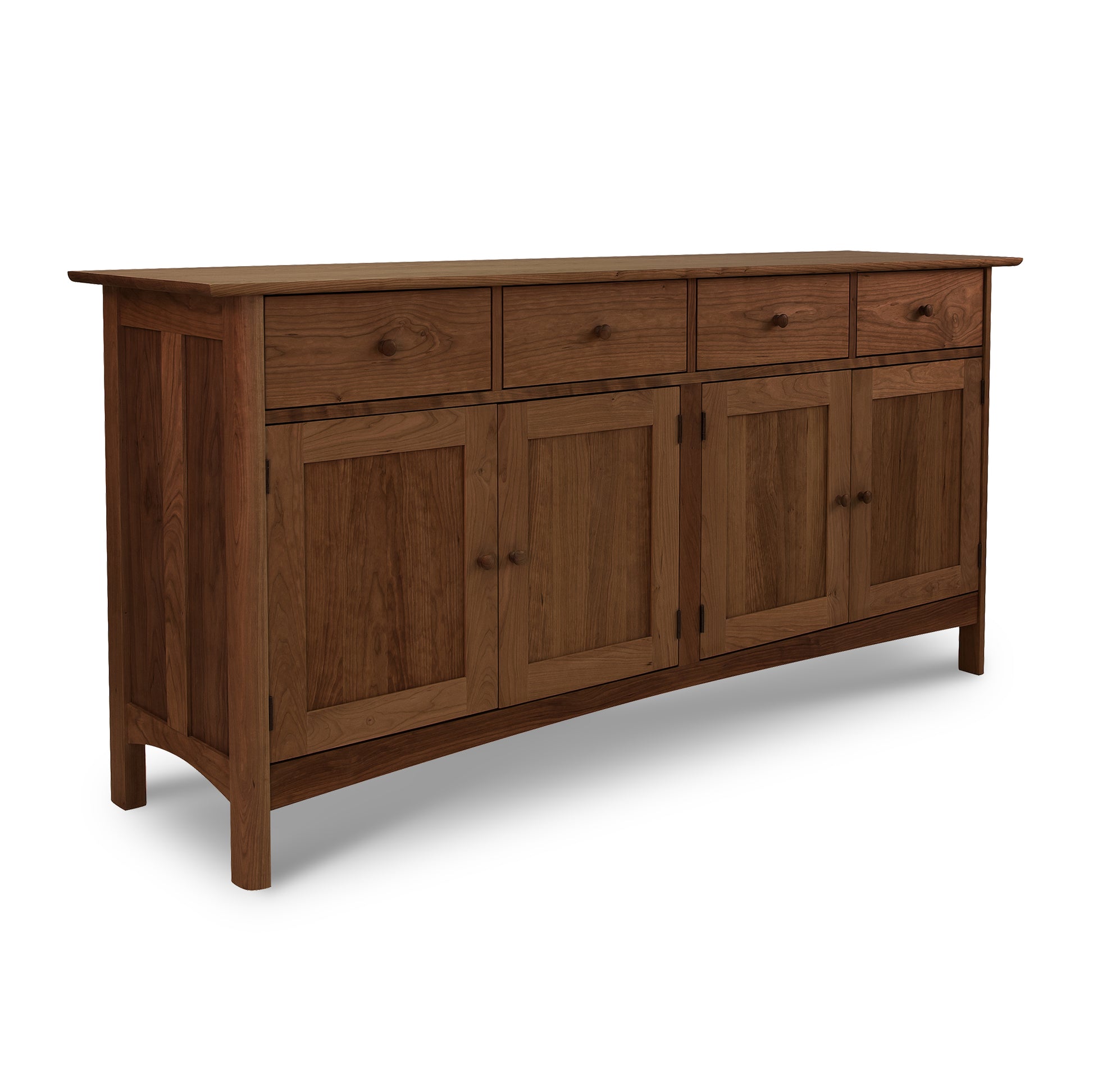 A Vermont Furniture Designs Heartwood Shaker Long Sideboard, crafted from solid wood with an eco-friendly oil finish, features three drawers and three doors on a white background.