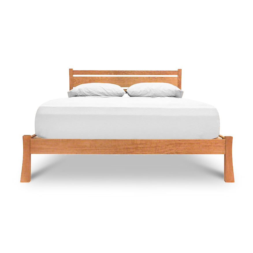 Horizon Platform Bed – Queen by Vermont Furniture Designs shown with headboard, white mattress, and two pillows. American made solid wood bed.
