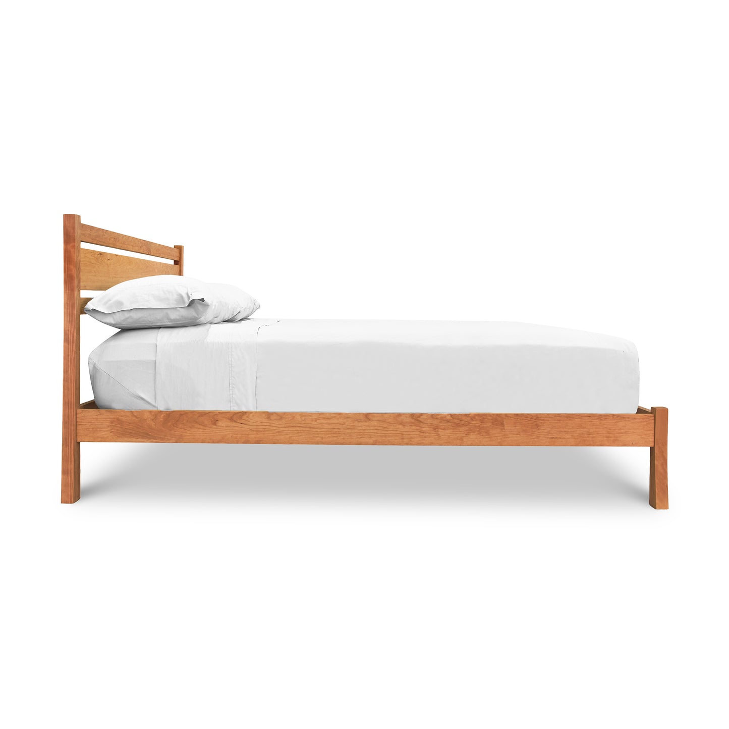 Vermont Furniture Designs Horizon Platform Bed in cherry wood, queen size, featuring elegant craftsmanship and white bedding, side profile view.