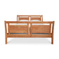 Handcrafted wooden Vermont Furniture Designs Double Incline Sleigh Bed with two visible pillows against a white background.