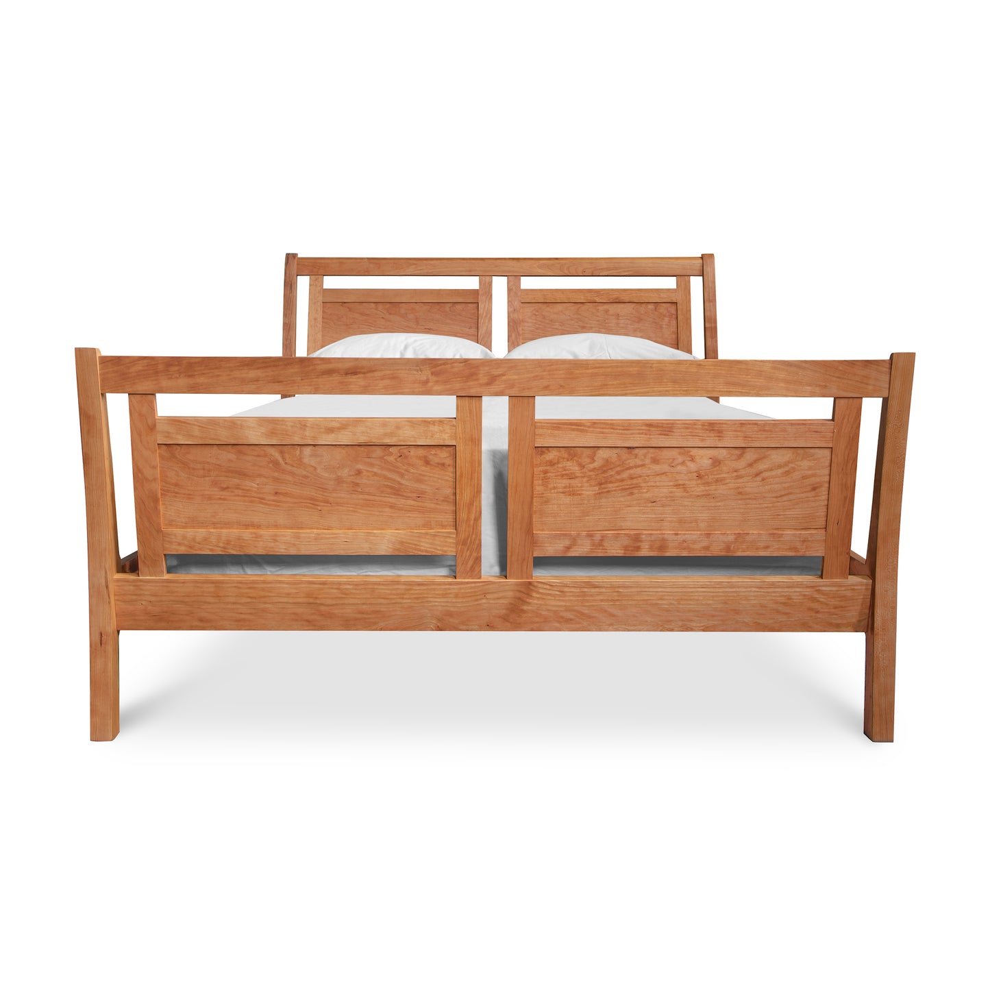 Handcrafted Incline Sleigh Bed by Vermont Furniture Designs featuring a solid wood frame with natural finish and a slatted headboard.
