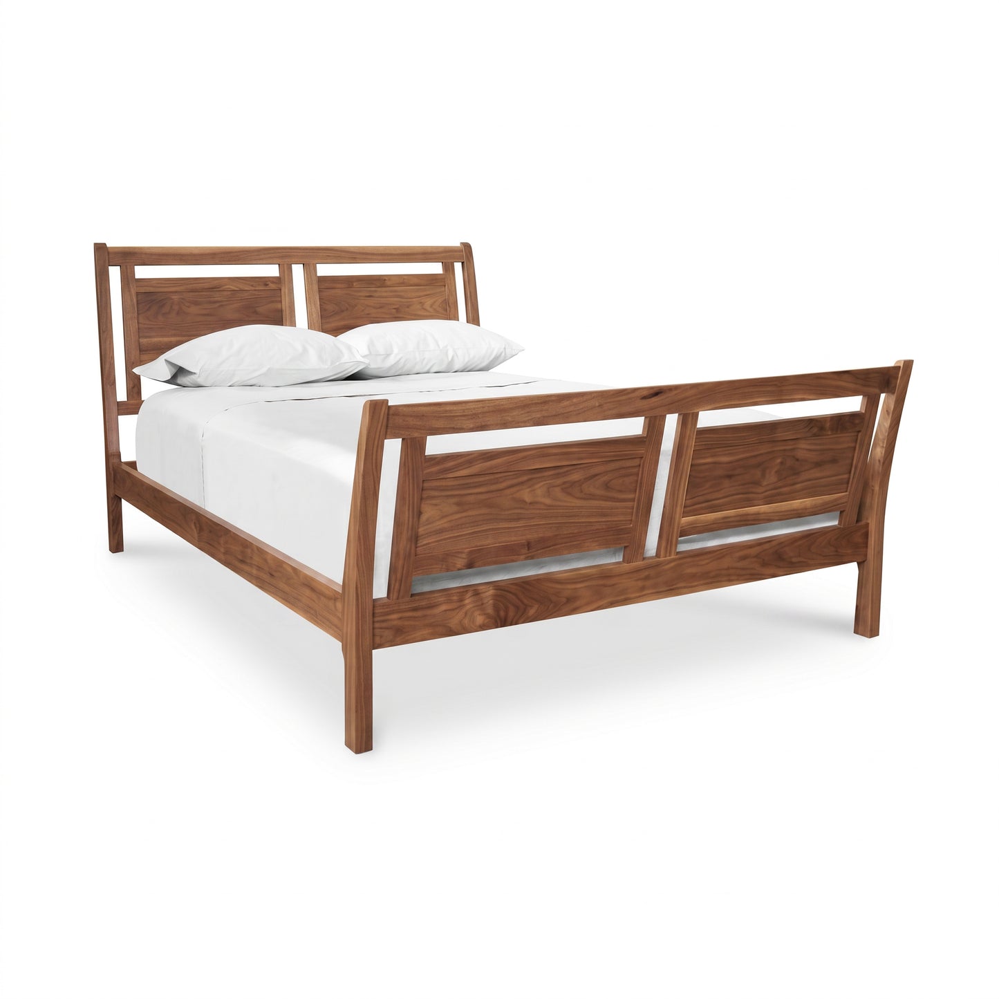 Incline Sleigh Bed by Vermont Furniture Designs in solid wood with headboard and footboard, shown with white bedding and two pillows.