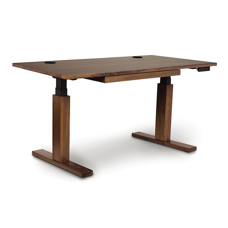 A standing desk with a wooden base.