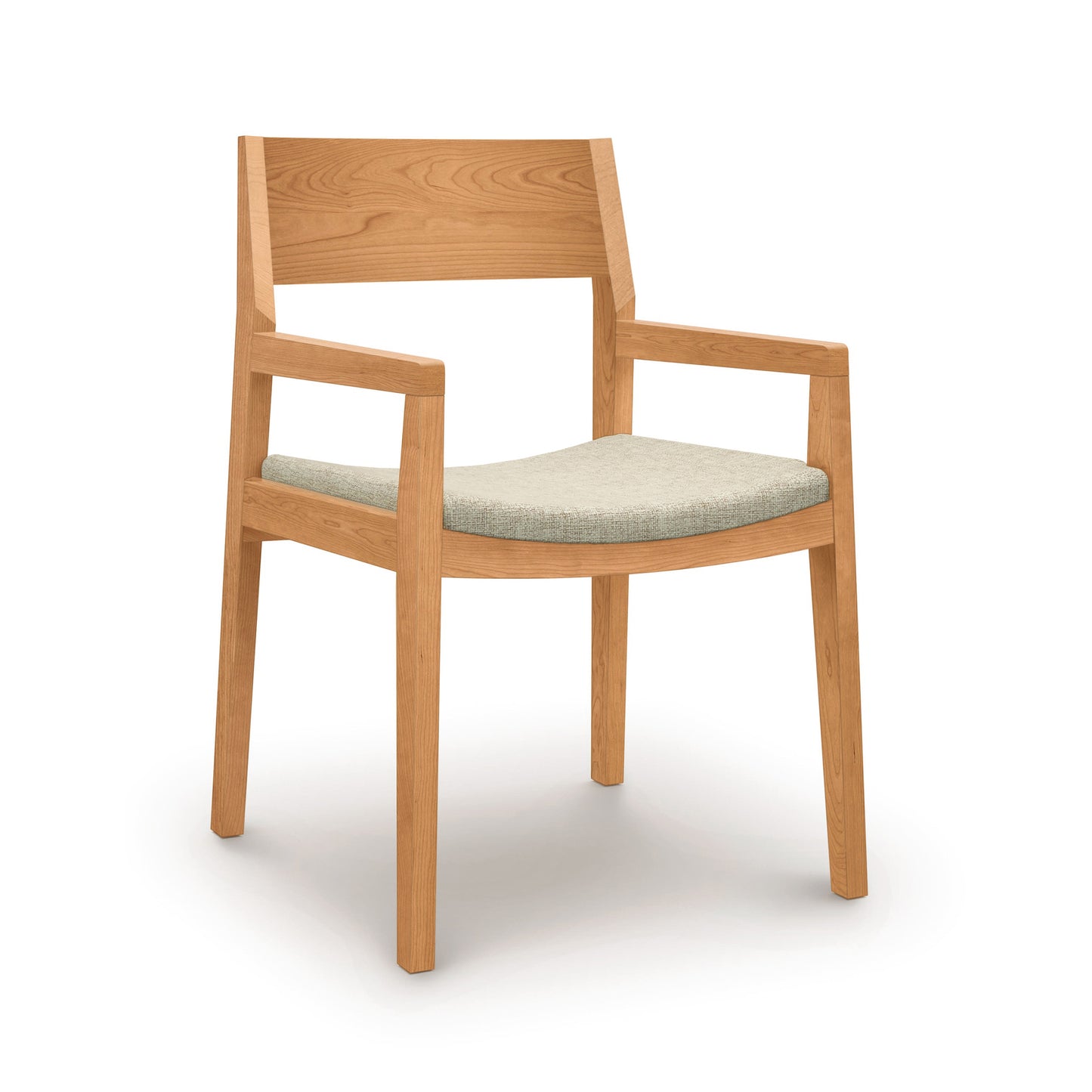 Iso Chair by Copeland Furniture in sustainable hardwood, featuring a light green cushion and high backrest.