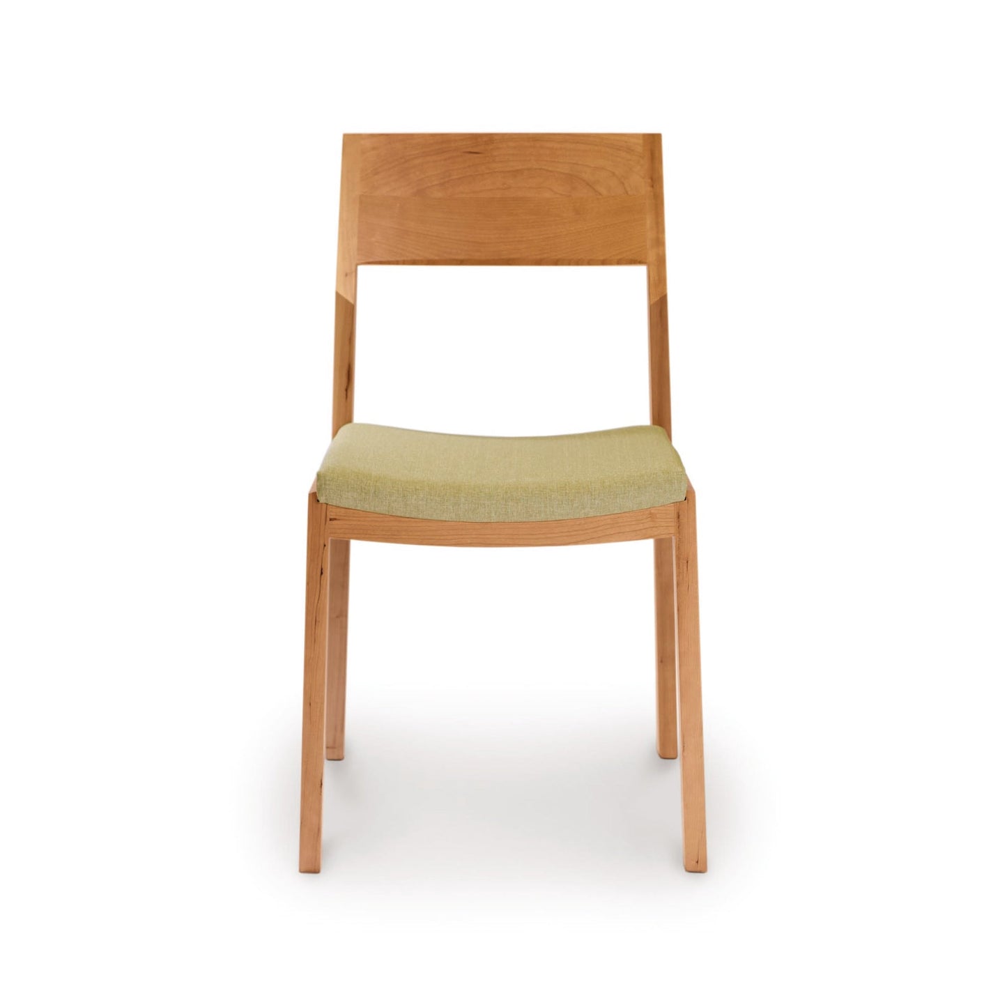 An Iso Chair - Priority Ship by Copeland Furniture, featuring a cherry wood frame and a green upholstered seat, made using sustainably sourced hardwoods.