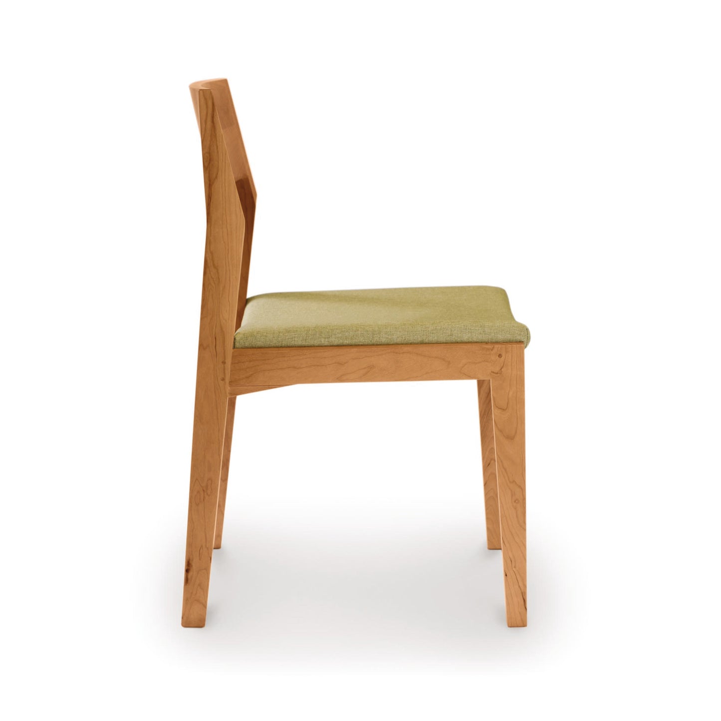 Iso Chair by Copeland Furniture in solid cherry with a light green cushioned seat, side view highlighting craftsmanship and modern design.